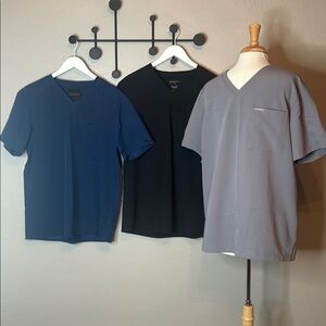(3) Men’s Jaanuu Gray, Black and Blue Scrub Top (L)